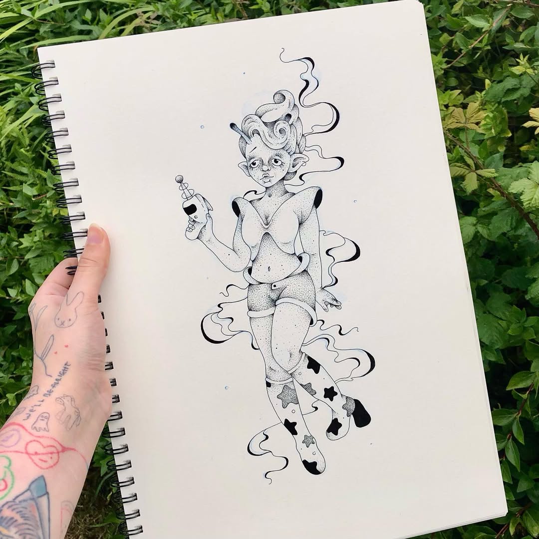 Alien girl with a raygun in shorts, futuristic top and star boots